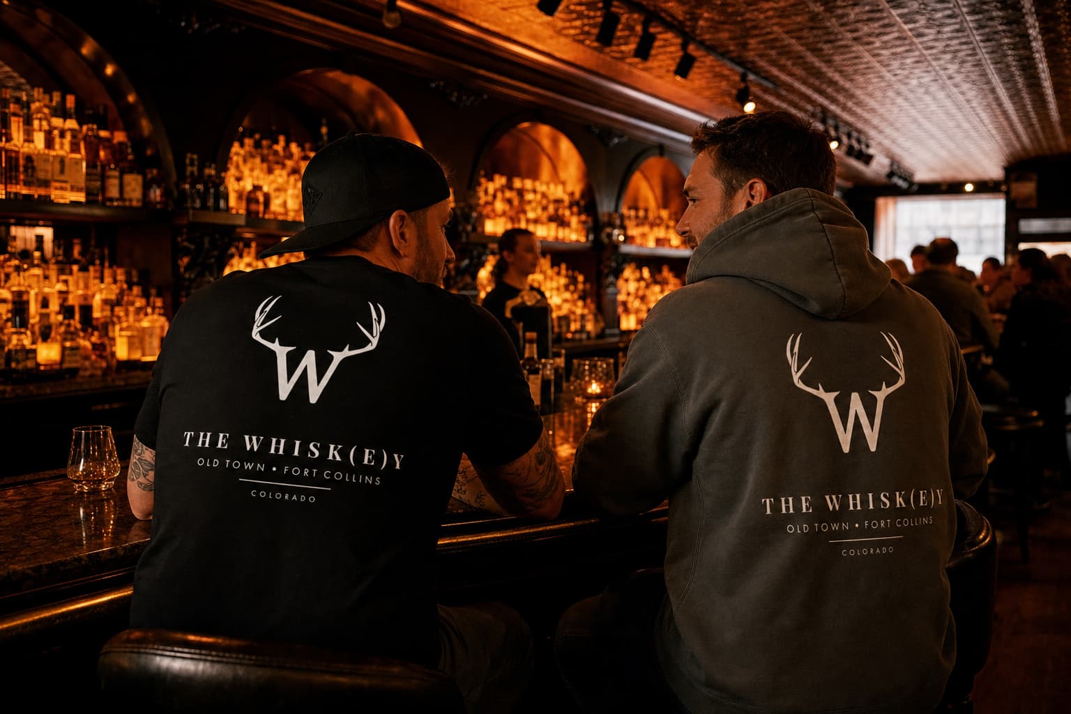 The Heritage Tee and Backbar Hoodie worn together at The Whisk(e)y bar