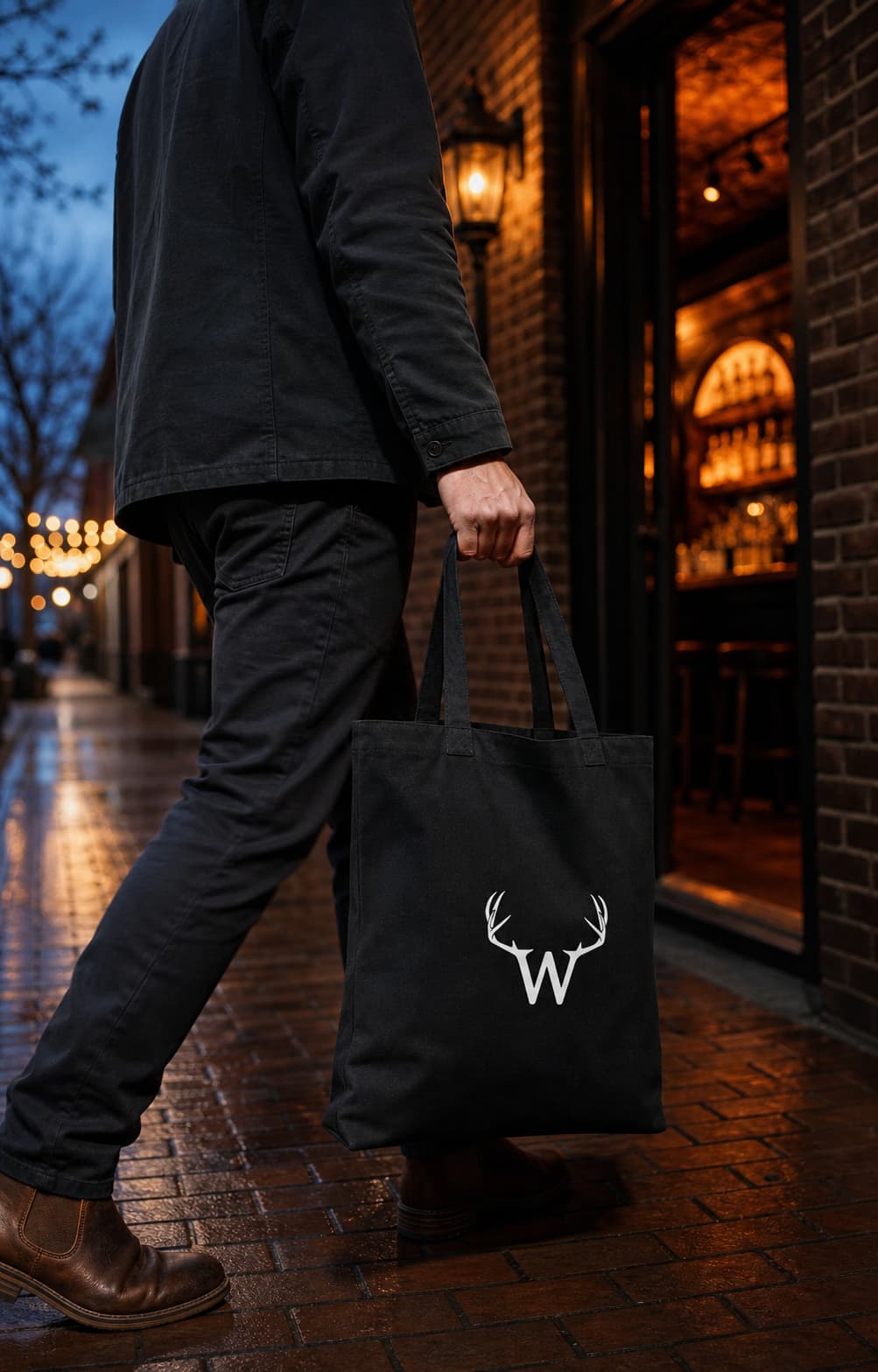 The Old Town Tote carried along a brick passage at blue hour